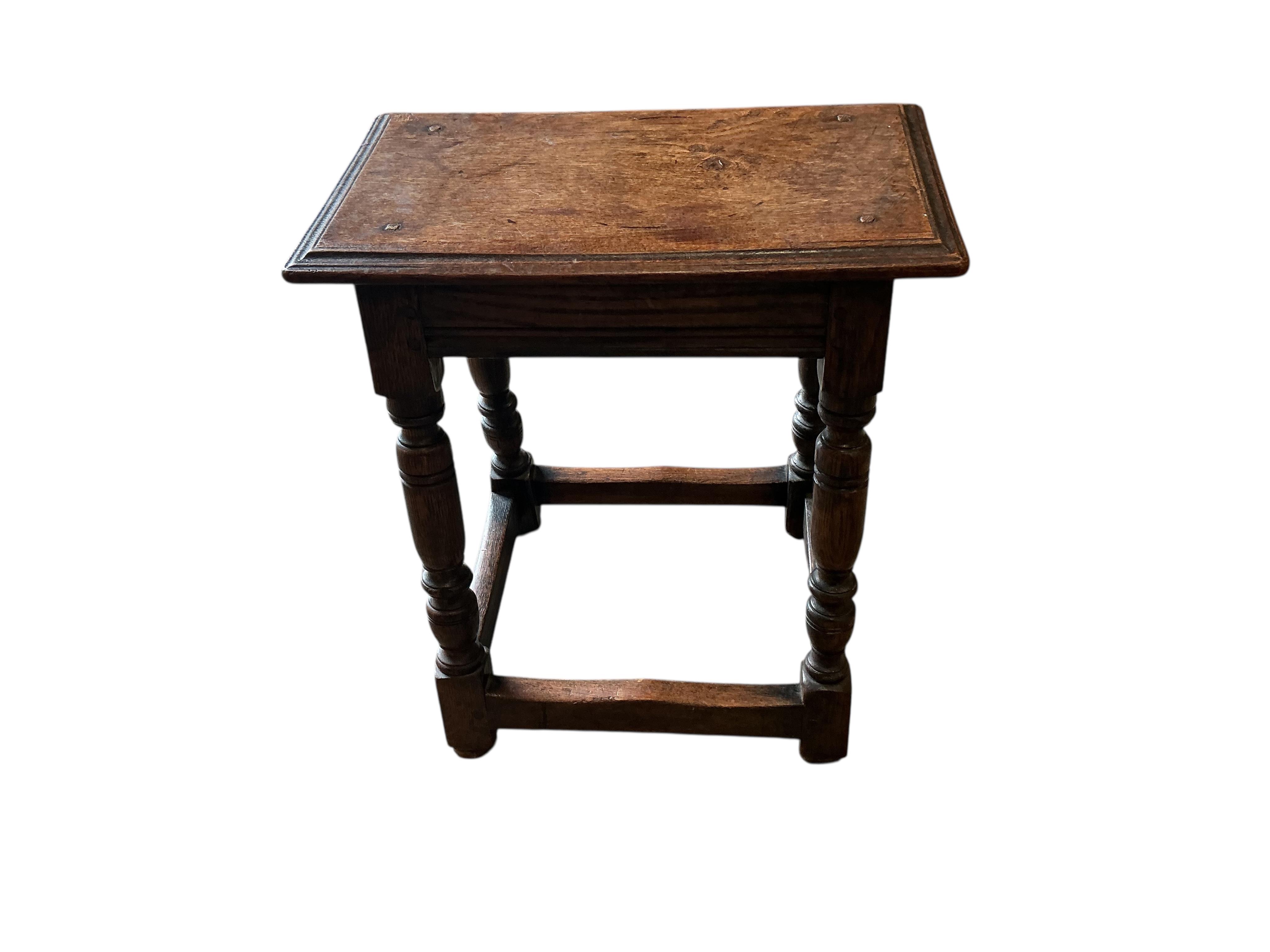 A 17th century style oak joint stool, width 46cm, depth 26cm, height 52cm